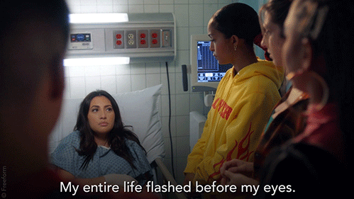 Woman in hospital gown saying 'My life flashed before my eyes'